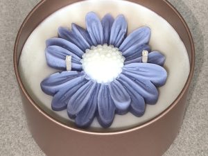 Bougie marguerite - linge propre